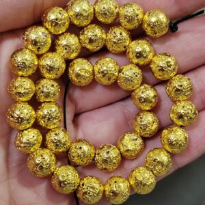 36 cuentas lava doradas 8mm