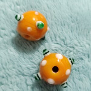 1 cuenta de murano naranja puntitos verdes 15mm