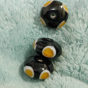 1 cuenta rondel murano puntitos blancos y amarillos 
18x11mm